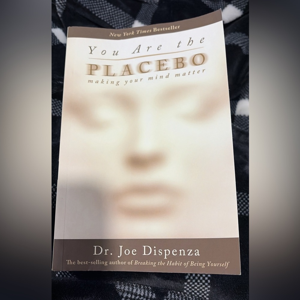 Source Unknown You Are the Placebo by Dr. Joe Dispenza - Cream and Brown Cover